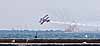 Pitts S-1-11B making low pass in front of fireboat, CIAS 2007