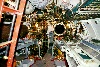 A picture of the torpedo launch tubes of the Cod, from inside the sub.  You can also see bunks in which some of the men would sleep.