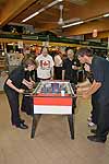 Some band members play foosball after our concert in Maranello