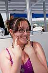 Lisa fakes a smile while feeling seasick on a cruise