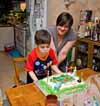 My nephew Christopher blows out candles on his 5th birthday cake