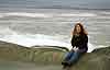 Jen sitting on the rocks at Peggy's Cove