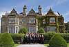 The band poses for a group photo at Muckross House in Killarney National Park