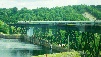 The train travels over a curved trestle - picture taken from inside the last car